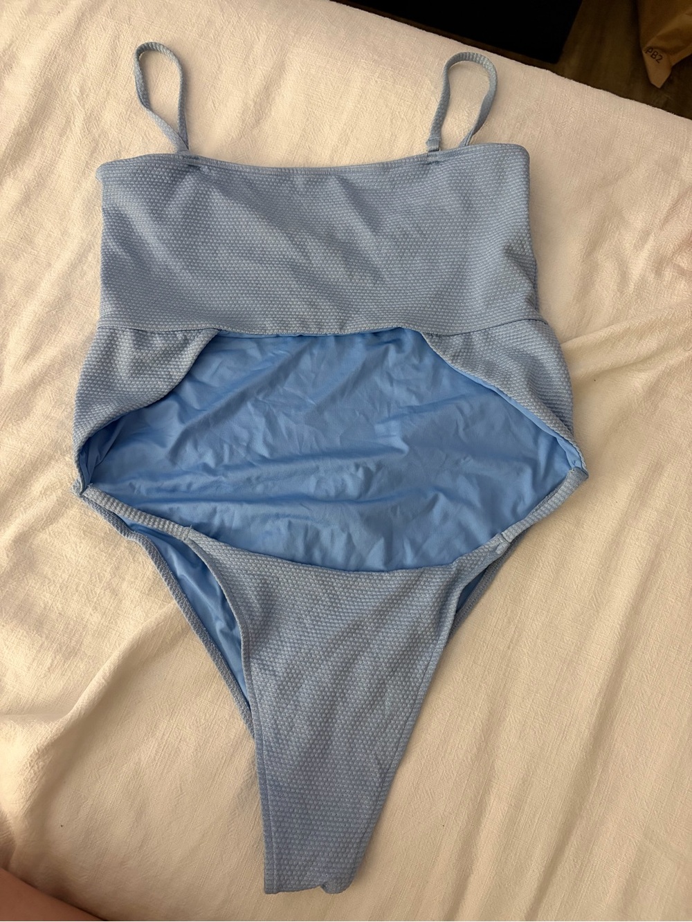 Light Blue One-Piece Swimsuit with Cutout